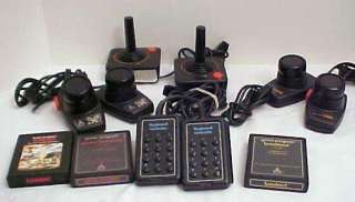ATARI LOT OF 8 CONTROLS & 3 GAMES FOR 2600 SYSTEM SOLD AS UNTESTED AS 