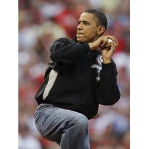 President Obama Winds Up to Throw Out the First Pitch During the MLB 