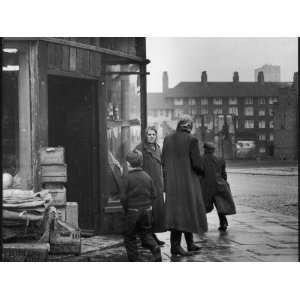  Four People on a Street Corner in Liverpool   New Housing 
