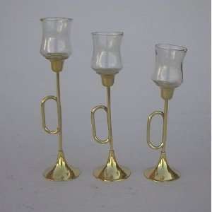 REAL SIMPLEA HANDTOOLED HANDCRAFTED BRASS TRUMPET AND GLASS CANDLE 
