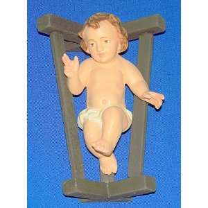  Resin figure of Baby Jesus on wooden Cradle   Medium 