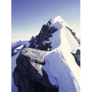  Climbing up a Snowy Ridge on Mt. Aspiring, New Zealand 