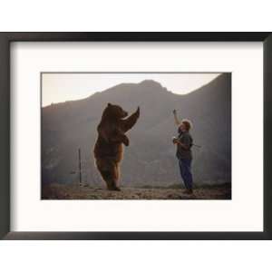 Trained Grizzly Bear Stands for a Jelly Treat Framed Photographic 