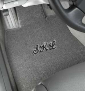   Ultimate” plush, auto floor mats, specially made and custom fit