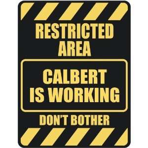   RESTRICTED AREA CALBERT IS WORKING  PARKING SIGN