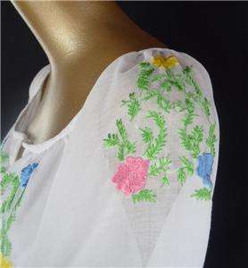 At Catseye Vintage is this gorgeous semi sheer hand embroidered cotton 
