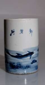 CHINESE BLUE AND WHITE BRUSHPOT FISH IN A STREAM  