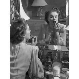  Woman Applying Lip Stick in Front of Mirror Photographic 