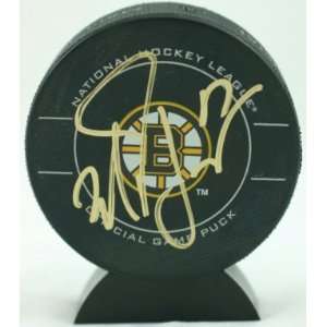 Milan Lucic Autographed Game Puck   Autographed NHL Pucks