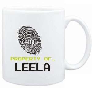  Mug White  Property of _ Leela   Fingerprint  Female 