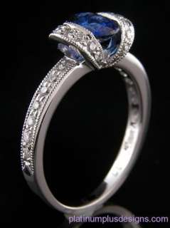 OVAL SAPPHIRE WITH DIAMOND 18K GOLD RING  