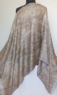 This is an elegant, light weight shawl with a jacquard woven, jamavar 