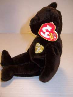 This is a TY 2003 Signature Bear Beanie Baby Plush. This plush is in 