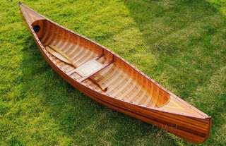 This display canoe measures 118.5 long from bow (front) to stern 