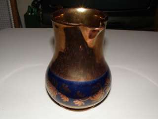 Beautiful Copper Lusterware pitcher with cobalt accents  