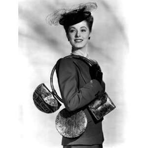 Eleanor Parker Carrying 3 Small Handbags of Blueberry Red Reptile 