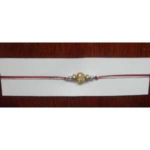  Rakhi (Rakhee)   Golden Ball Studded with Stones ($1 flat 